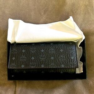 MCM continental style wallet, black with gray logos, pre owned, great condition